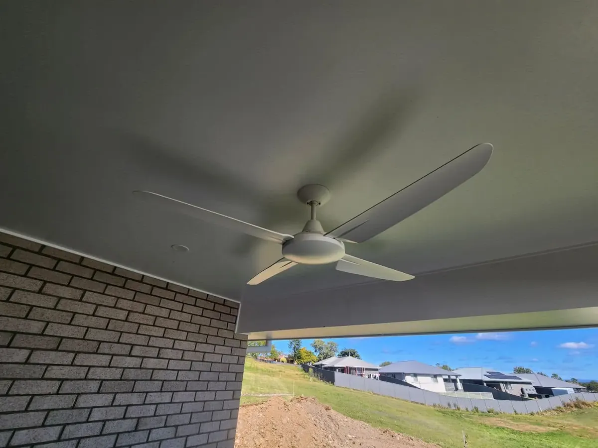 A newly installed ceiling fan on the alfresco ceiling of a recently built home