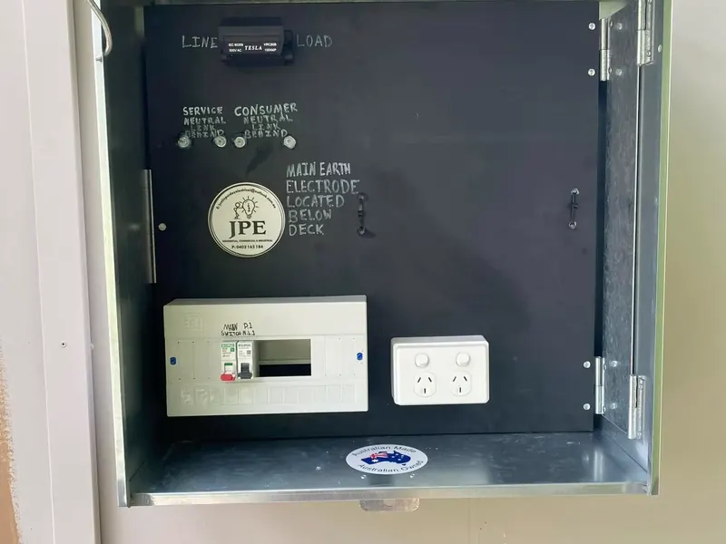 A recessed switchboard enclosure with a safety switch and power point
